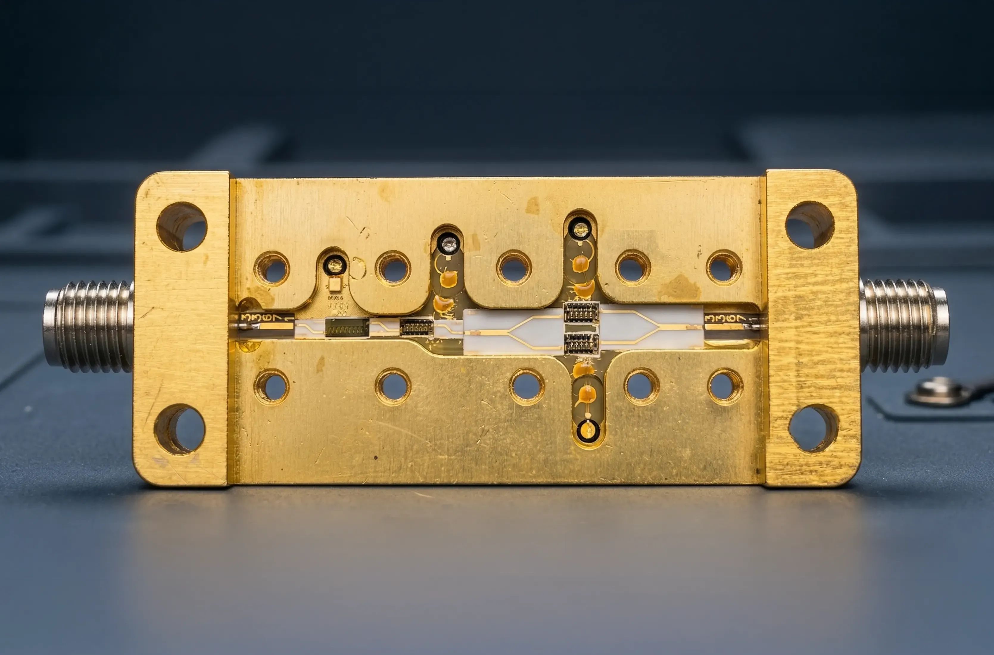 Microsource microwave amplifier chip-and-wire hardware